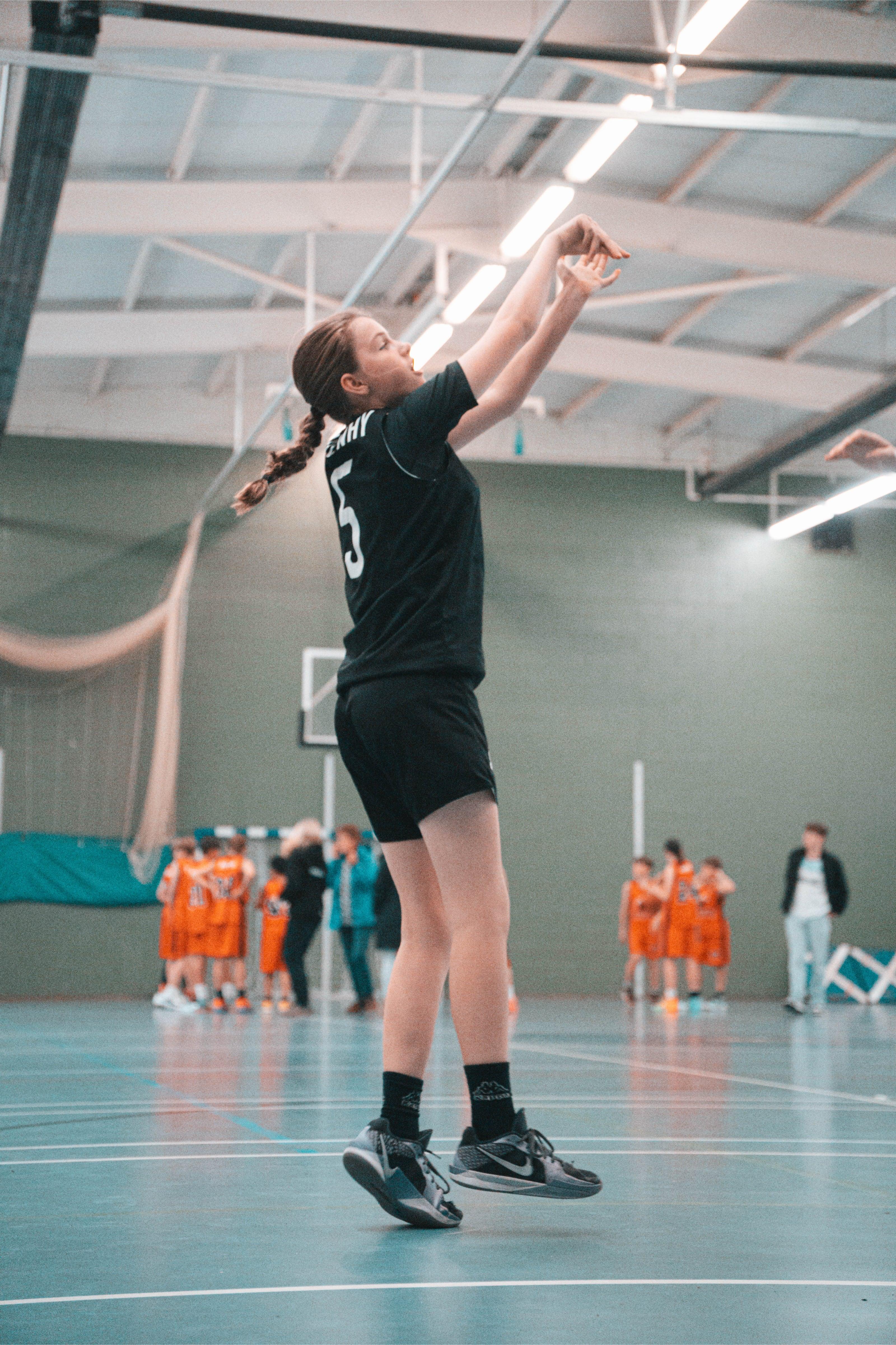 Girl Shooting the ball during warm-up